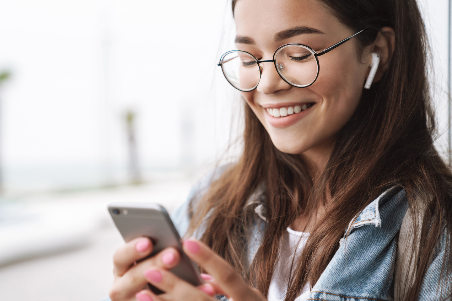 Woman smiling in front of a landing page