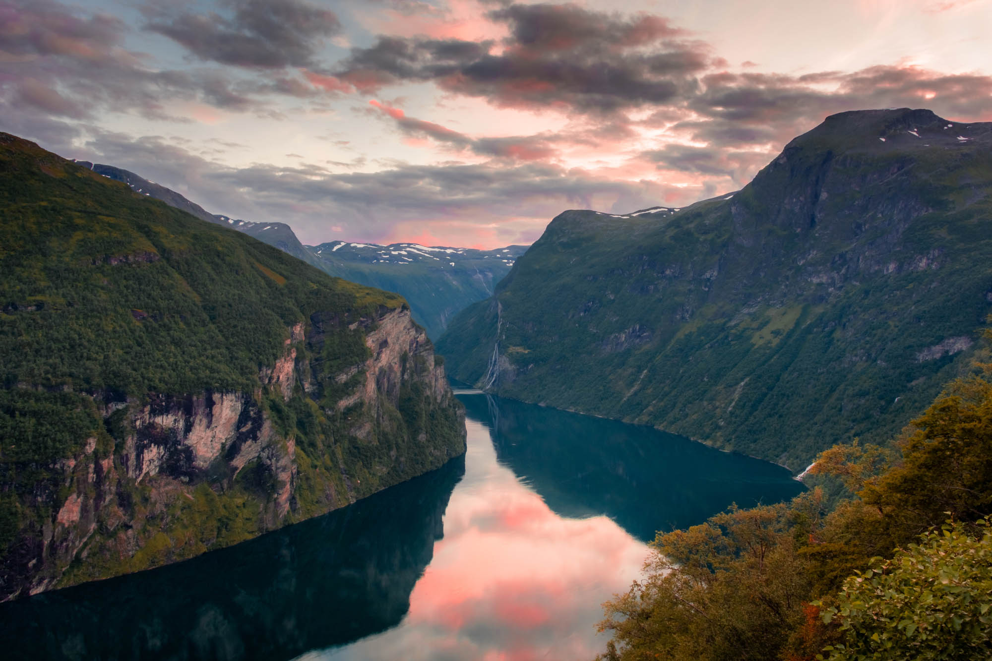 Geirangerfjord at dusk, one of Norway’s most dramatic UNESCO World Heritage fjords