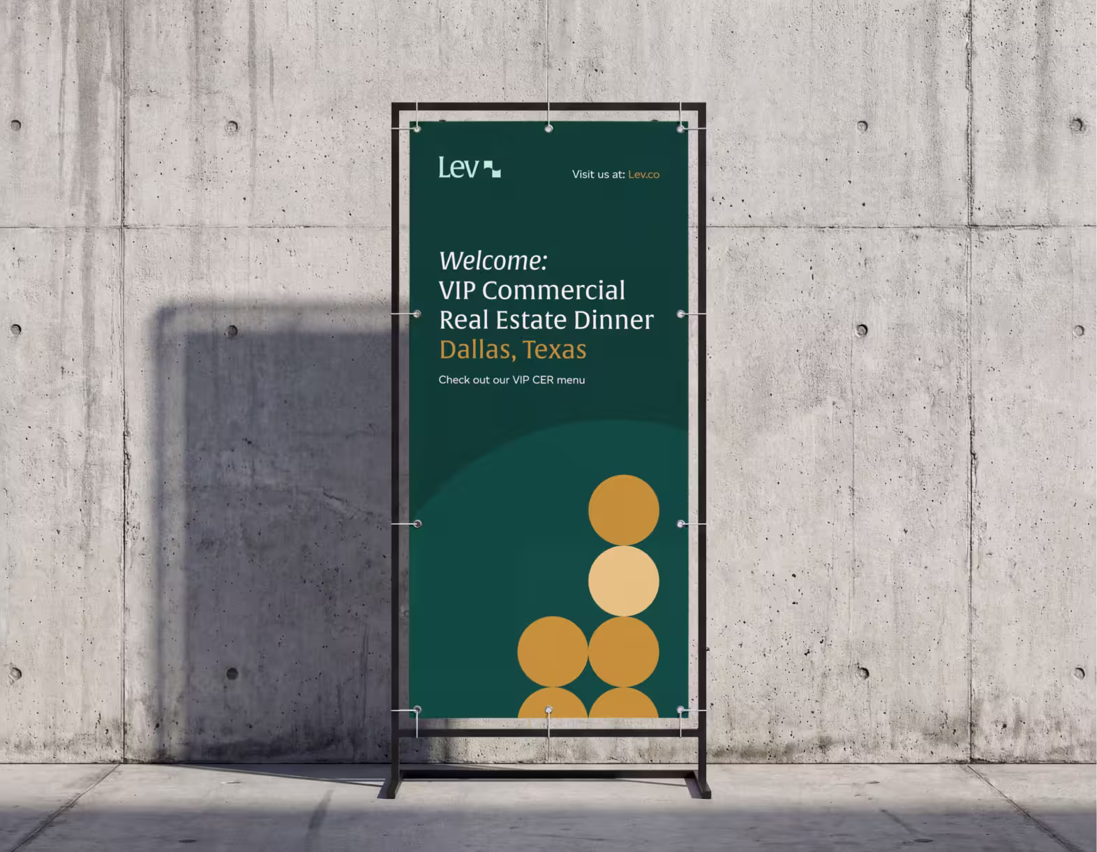 Sign on stand in front of concrete wall for VIP Commercial Real Estate Dinner in Dallas, Texas by Lev