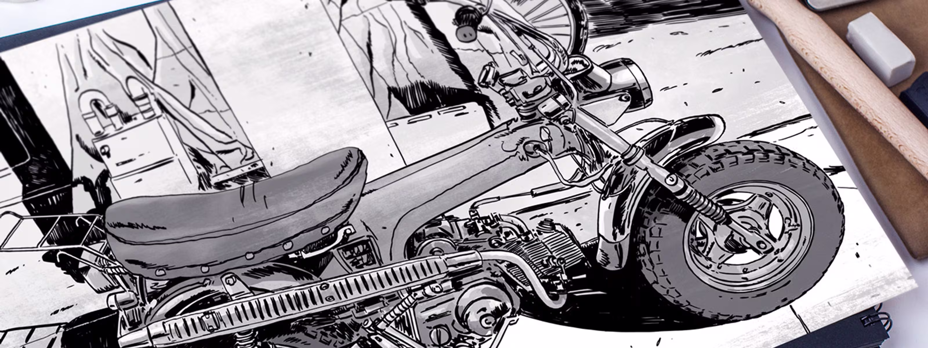 Black and white sketch of a vintage motorbike on a drawing board with a pencil and eraser nearby.