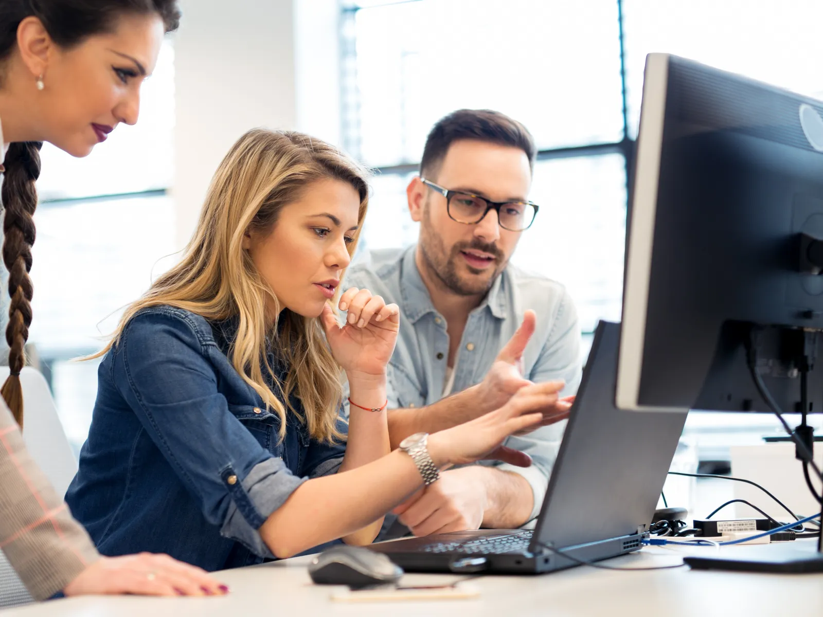 image of a team collaborating at an ai saas company