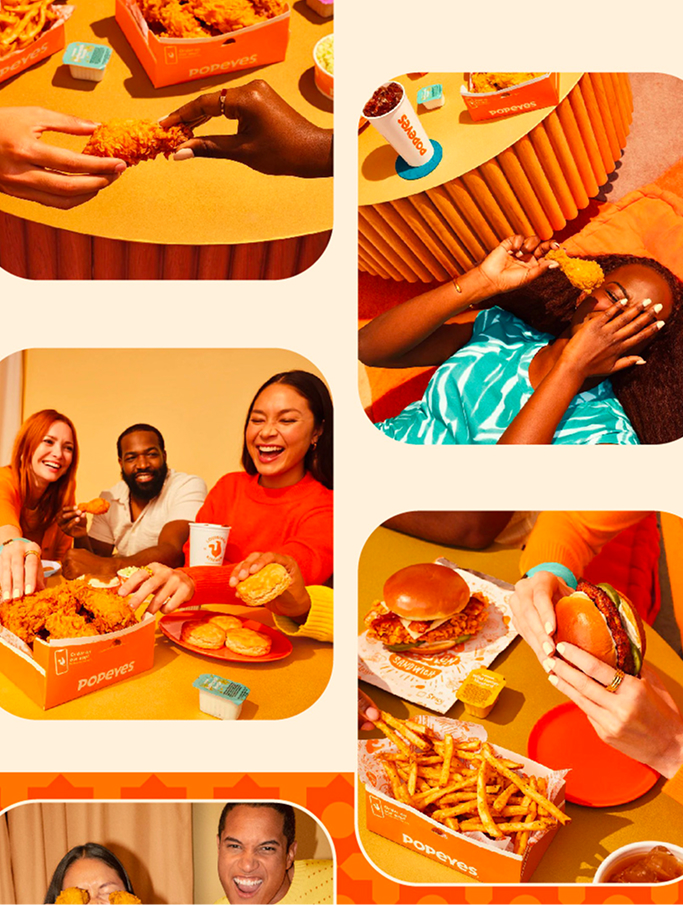 Varias personas disfrutan de pollo frito, hamburguesas y papas fritas de Popeyes en un ambiente alegre.