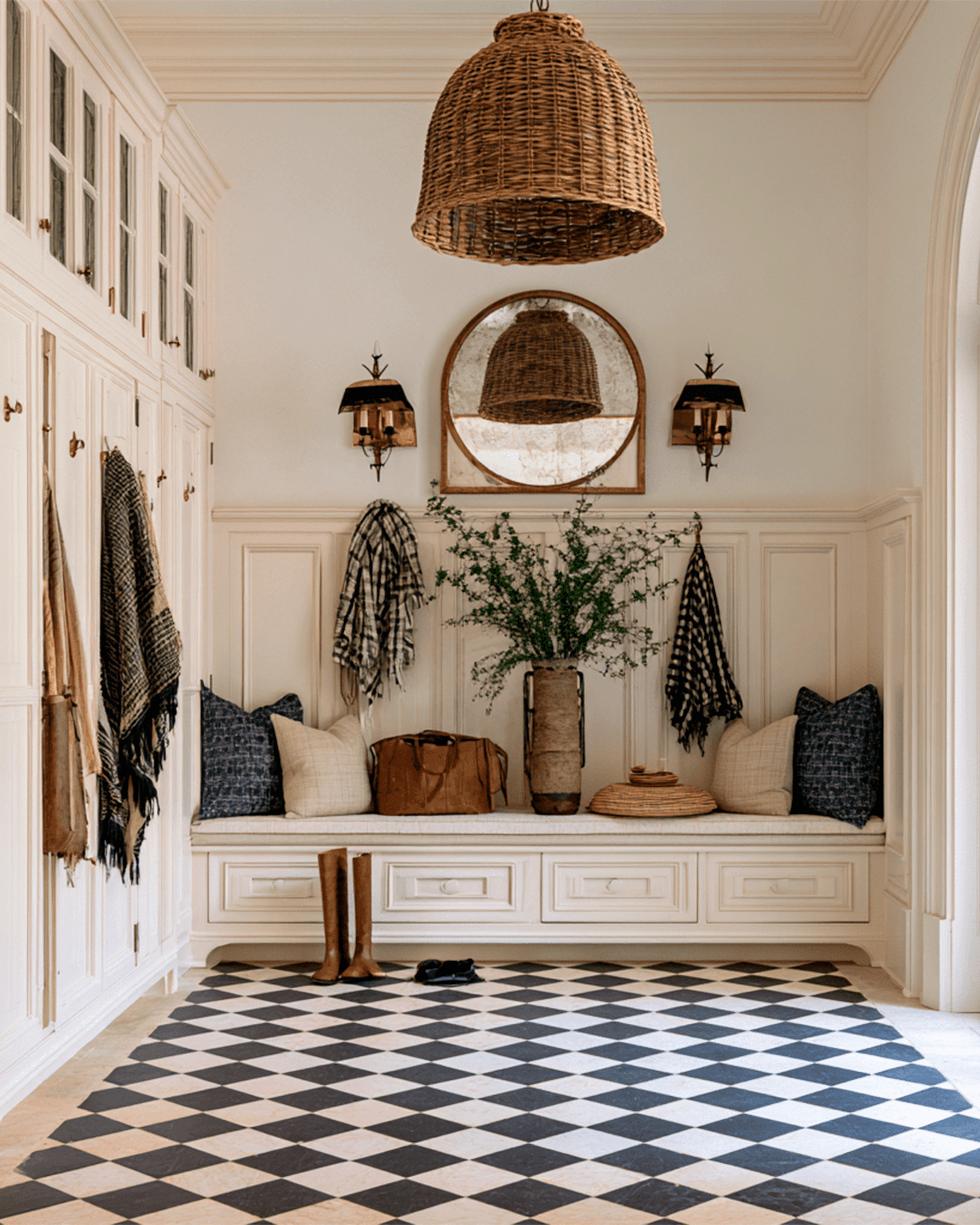 Mudroom with tile floor and built-ins