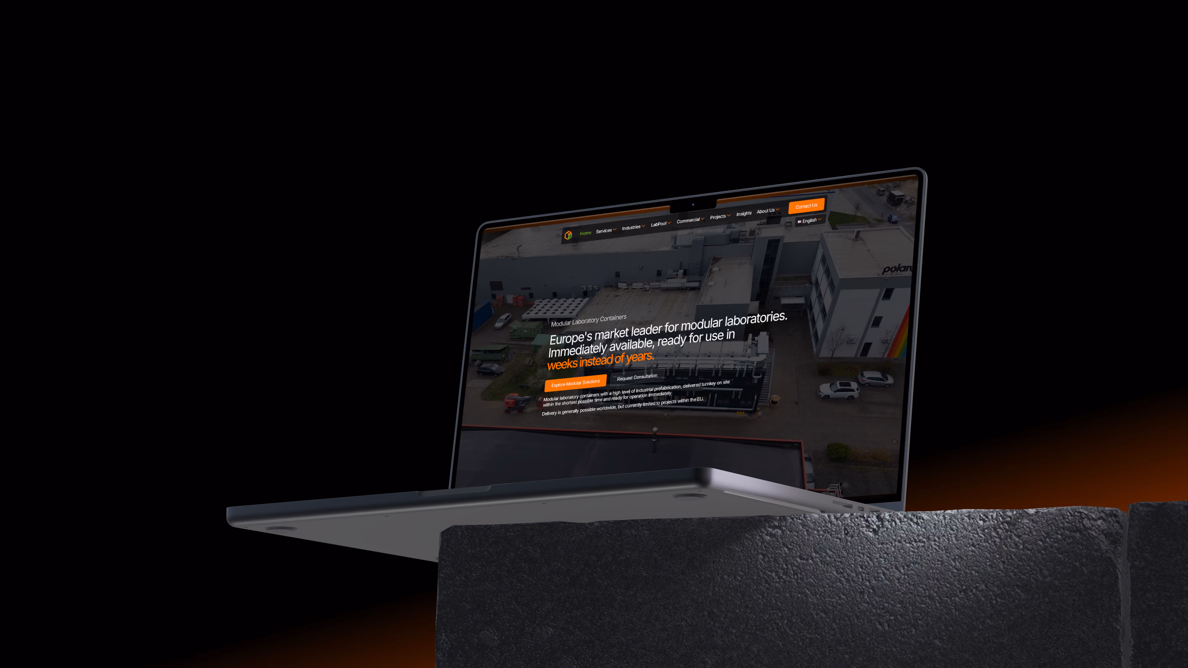 LAB Modulbau modular laboratory website shown on a laptop