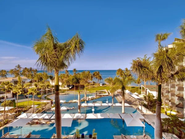 Andaz Maui's tiered infinity pools stepping down to Mōkapu Beach