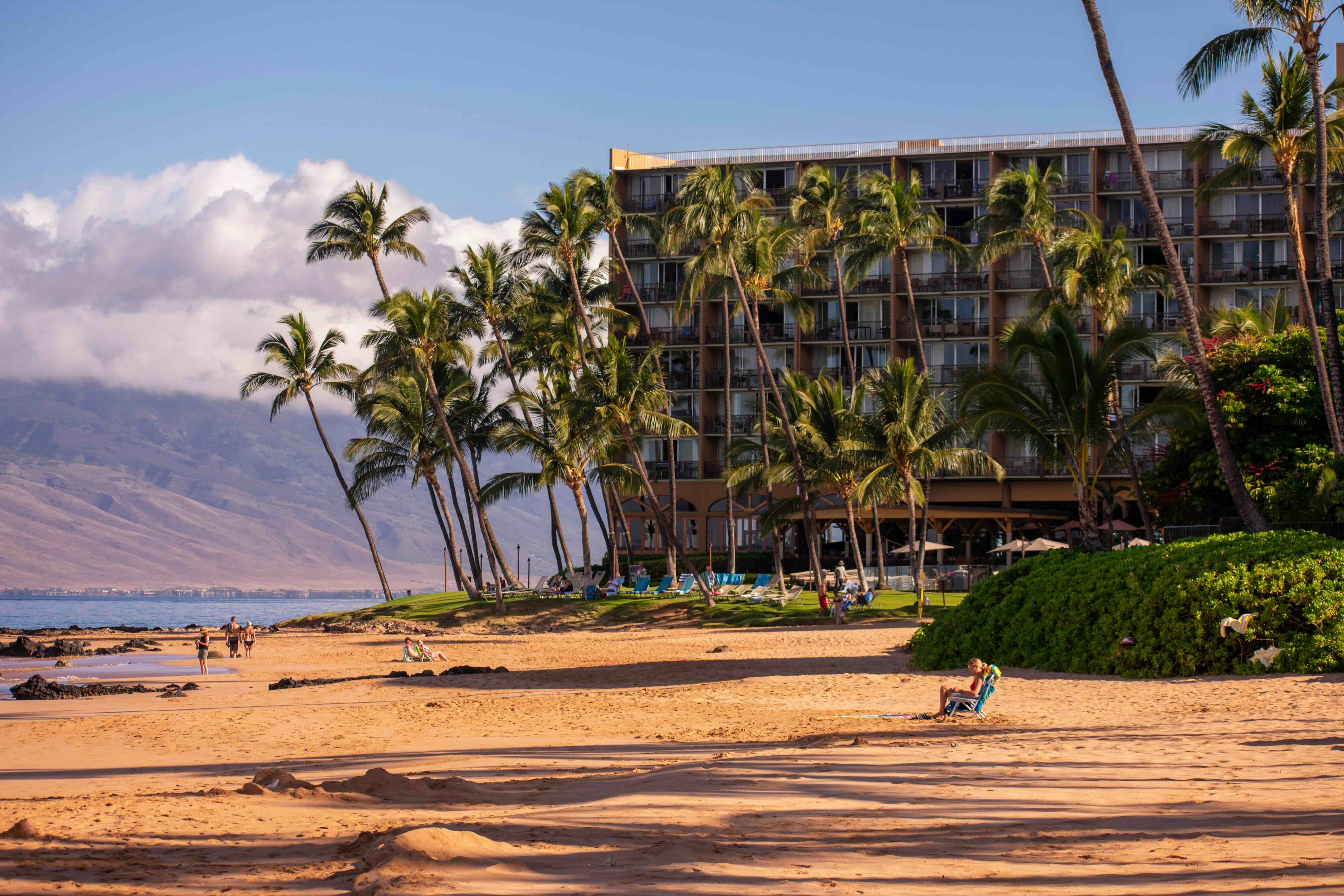 Keawakapu Beach in South Maui, a long curve of sand meeting calm water