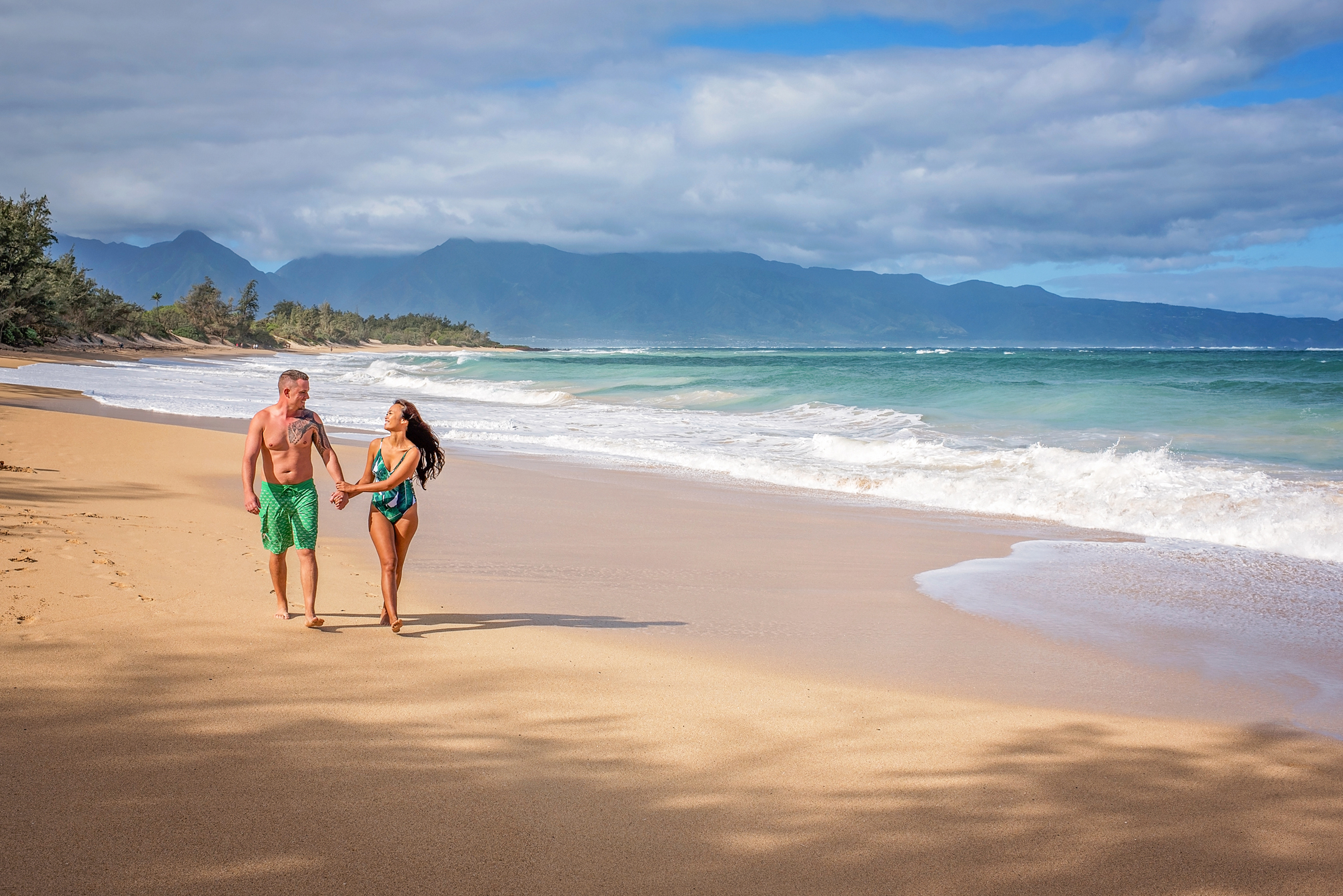 Baldwin Beach on Maui's north shore, a long open stretch of sand under morning light