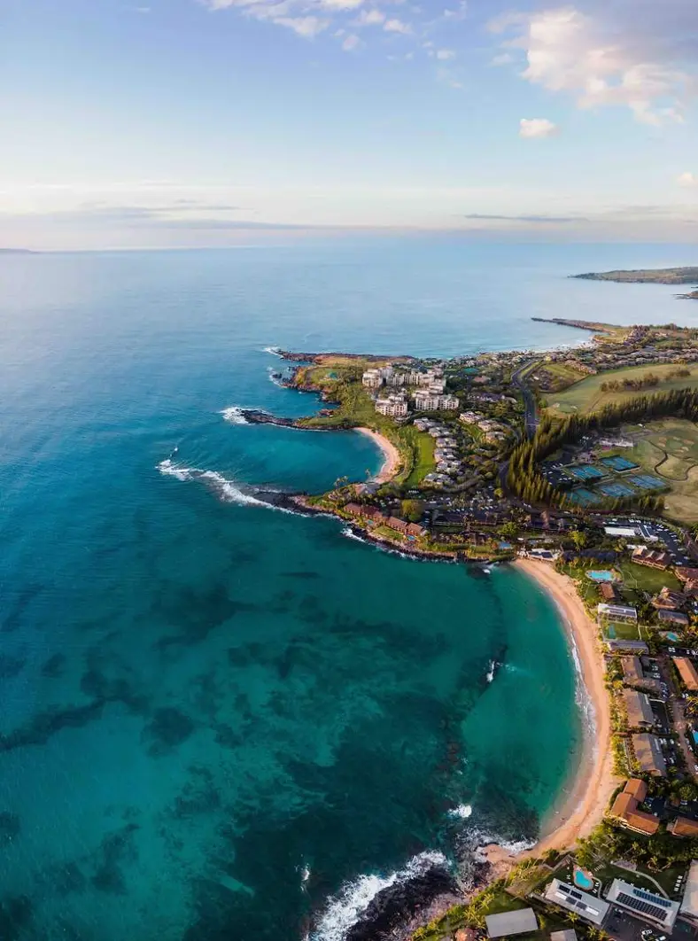 The sheltered crescent of Nāpili Bay on the Kapalua end of West Maui
