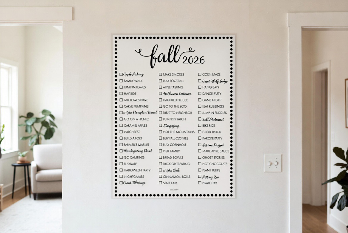 Fall 2026 bucket list print hanging in a living room