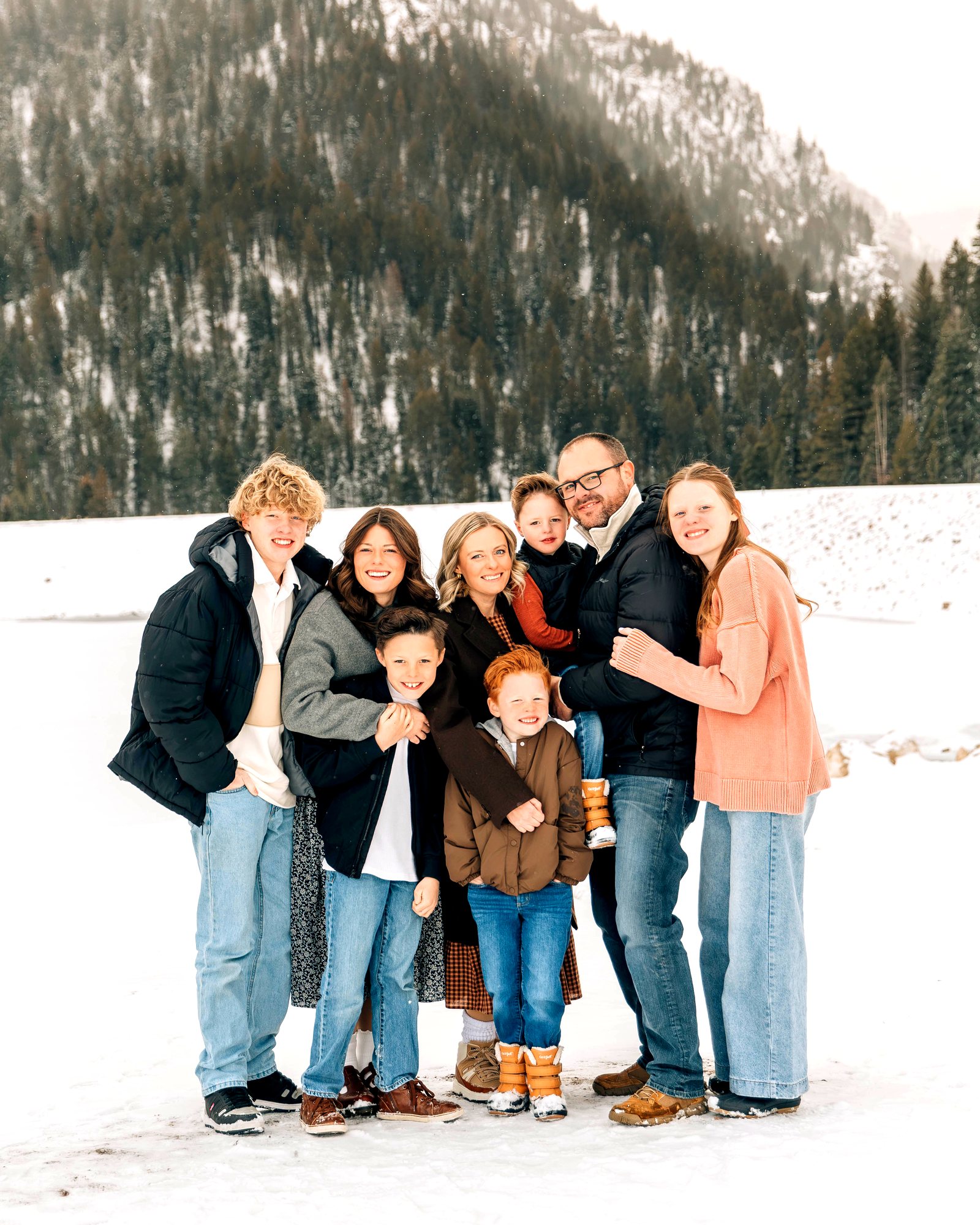The O'Neal family, all eight of us, in the snow in the Utah mountains