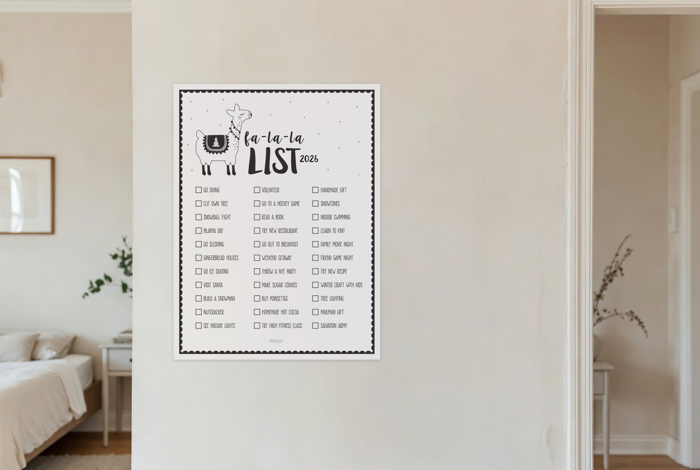 La La Llama bucket list print hanging in a living room