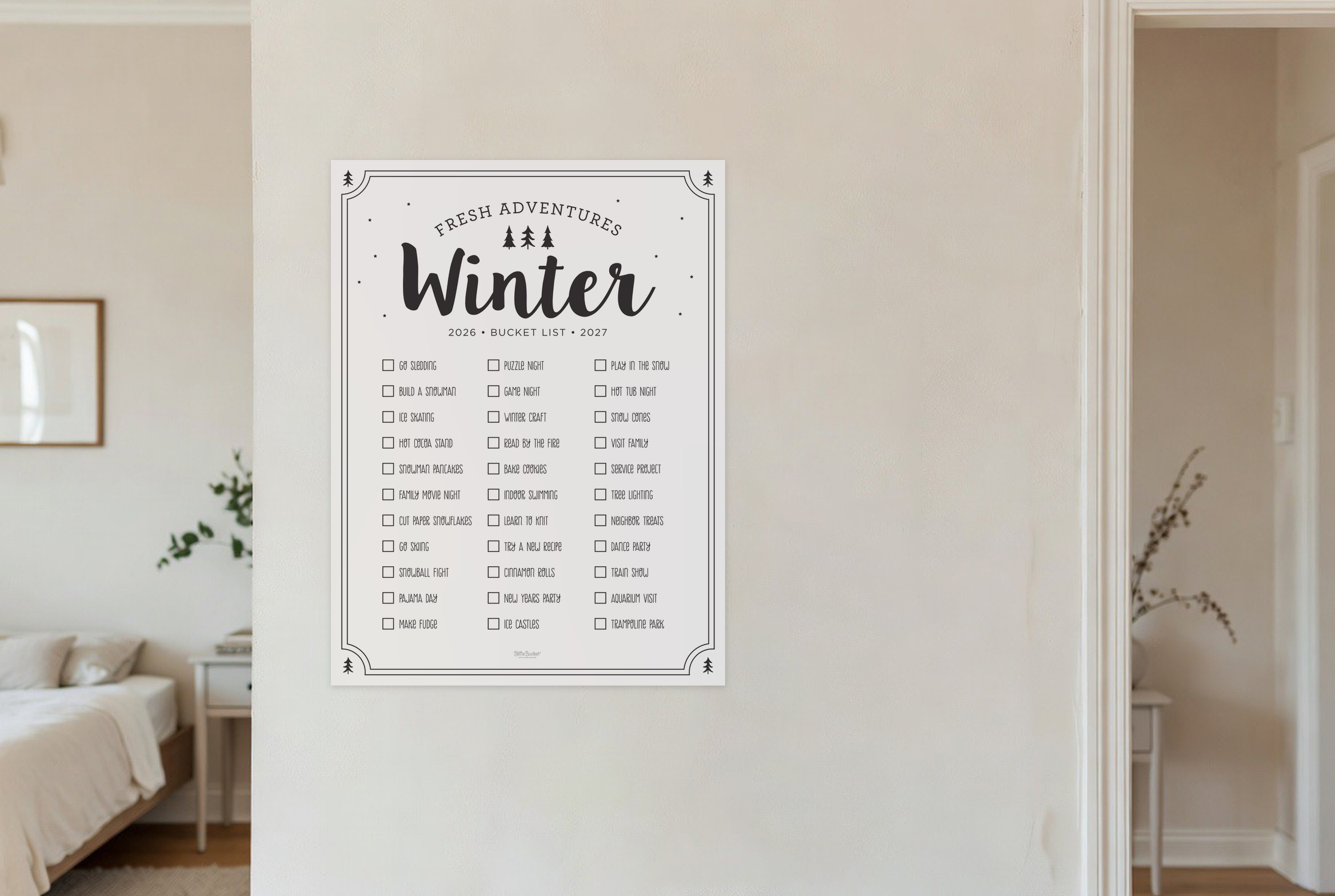 Winter Adventures bucket list print hanging in a living room