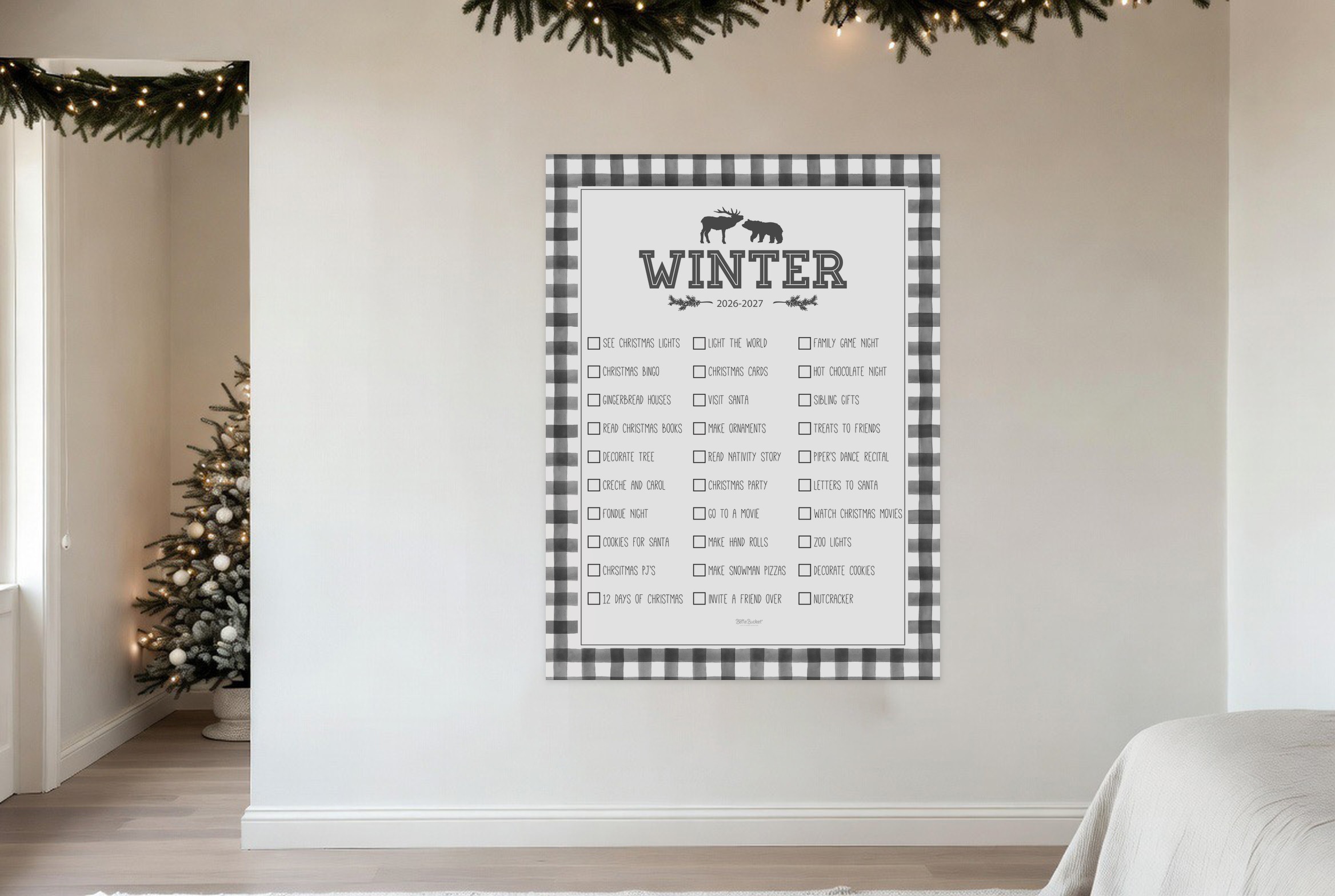 Winter Woodland bucket list print hanging in a living room