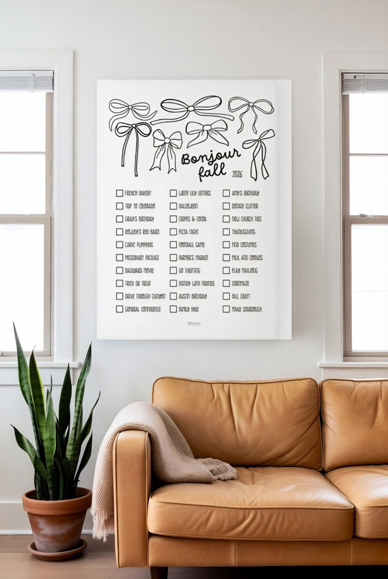 Bonjour Fall print above a leather couch