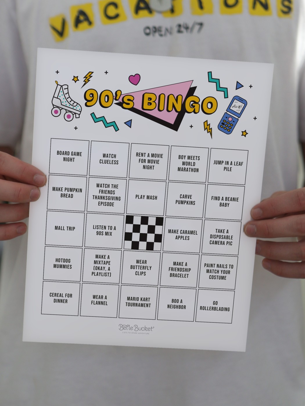 90s bingo card printable, printed and held up