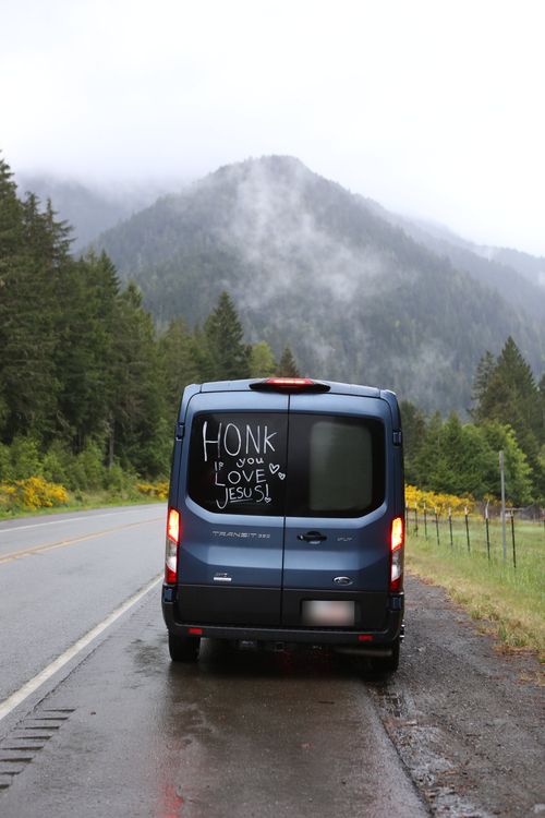 The van driving a mountain road