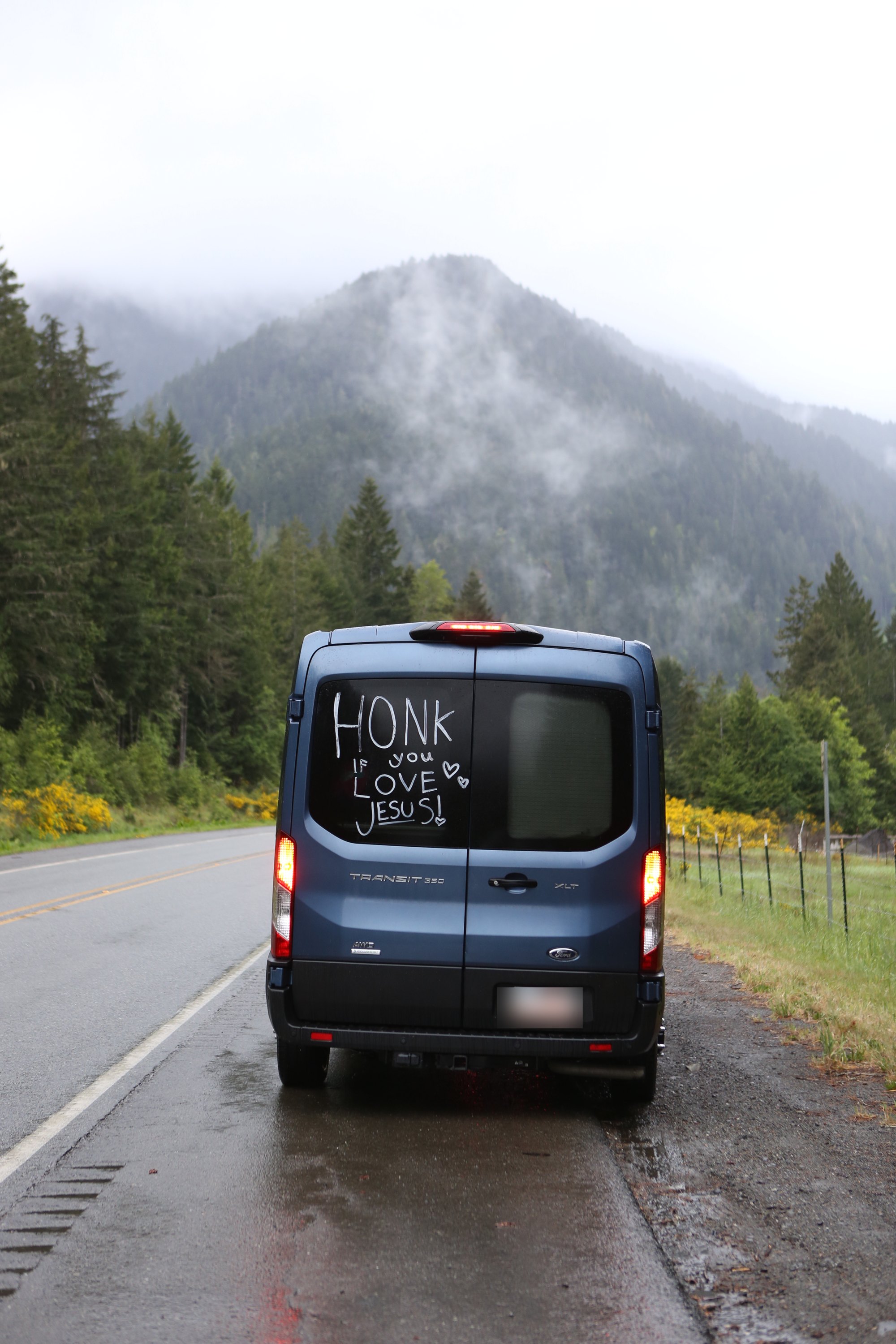 The back of the O'Neal Mobile with honk if you love Jesus written on the window