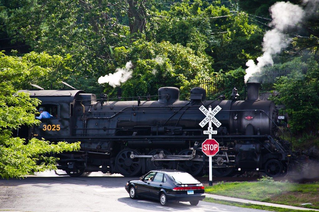 The Essex steam train at a crossing