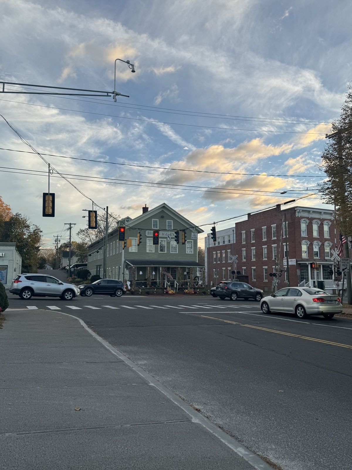 Main Street in New Milford at sunset with the flags out