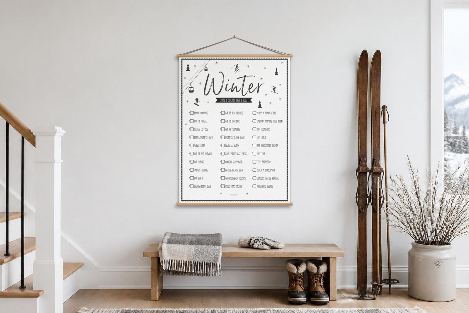 Winter 2026 to 2027 bucket list poster on a wood hanger in an entryway with a bench, snow boots and old wooden skis