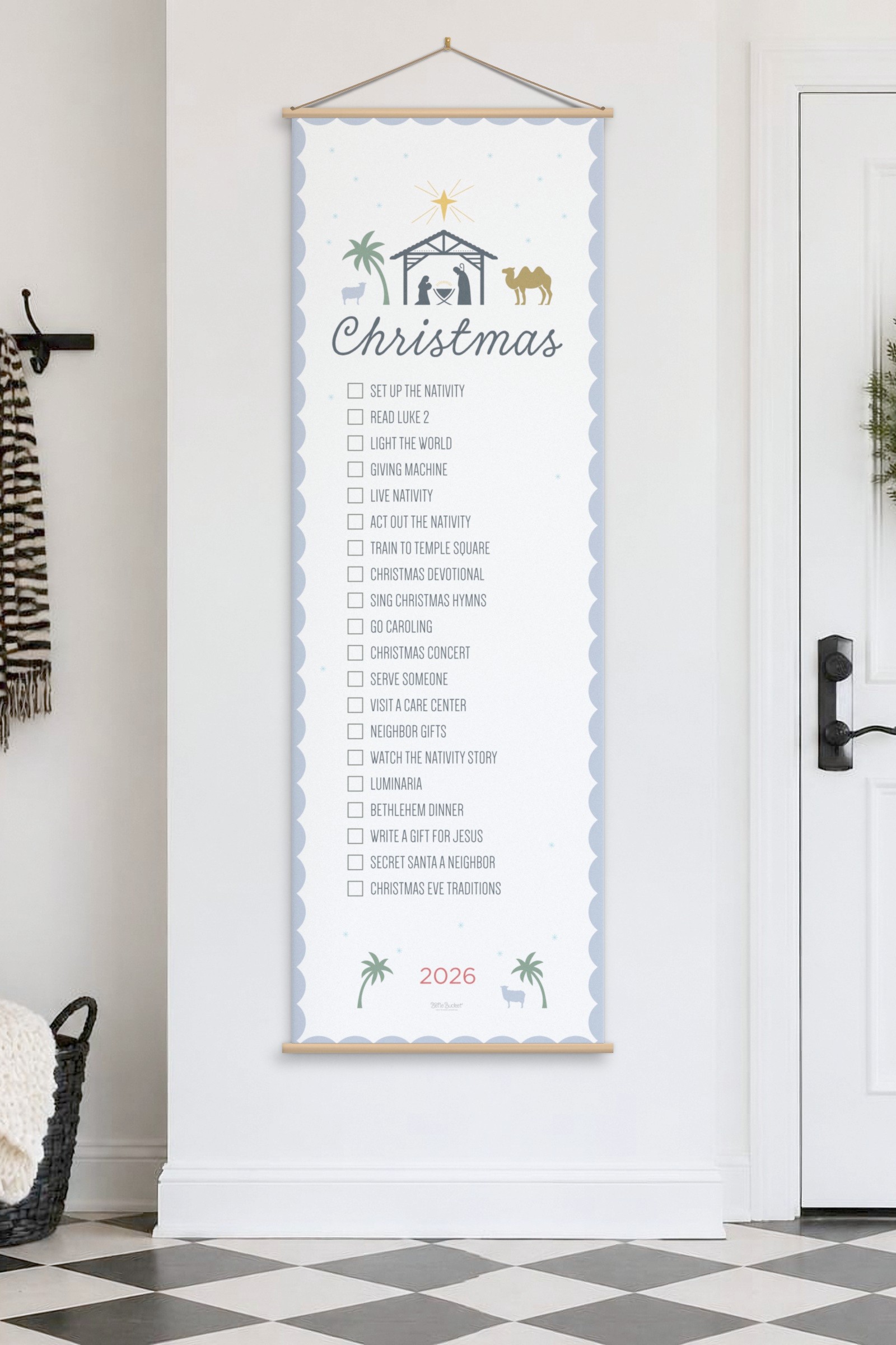 Christmas Nativity bucket list banner, 2 by 6 feet, on a wood hanger in a bright front entry