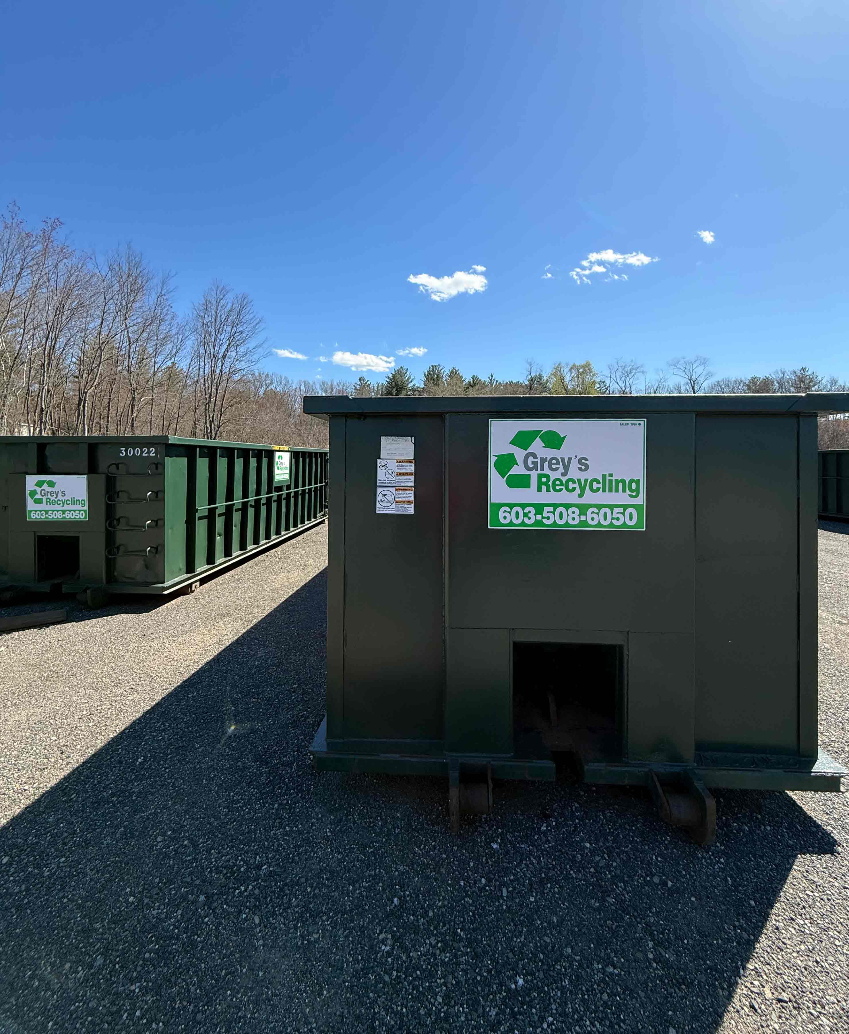 Grey’s Recycling roll-off dumpster at the company yard