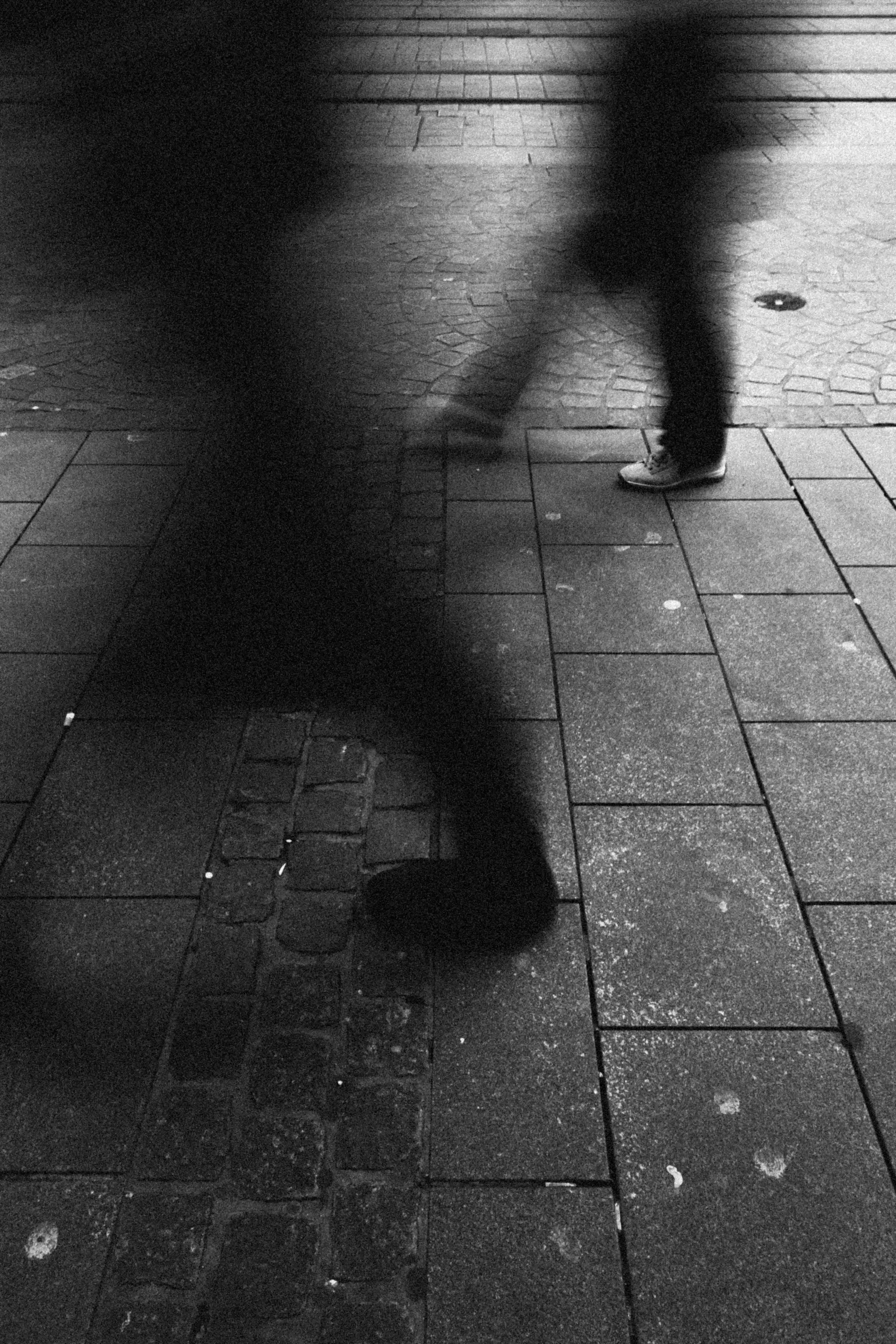 Blurred Walkers on a Footpath Image