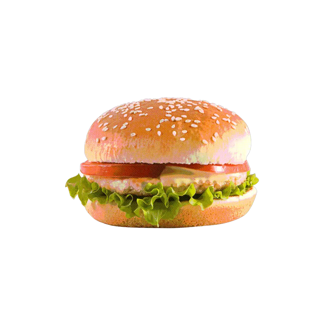 Un hamburger avec un pain aux graines de sésame, de la laitue, une tomate et de la mayonnaise, sur fond noir.