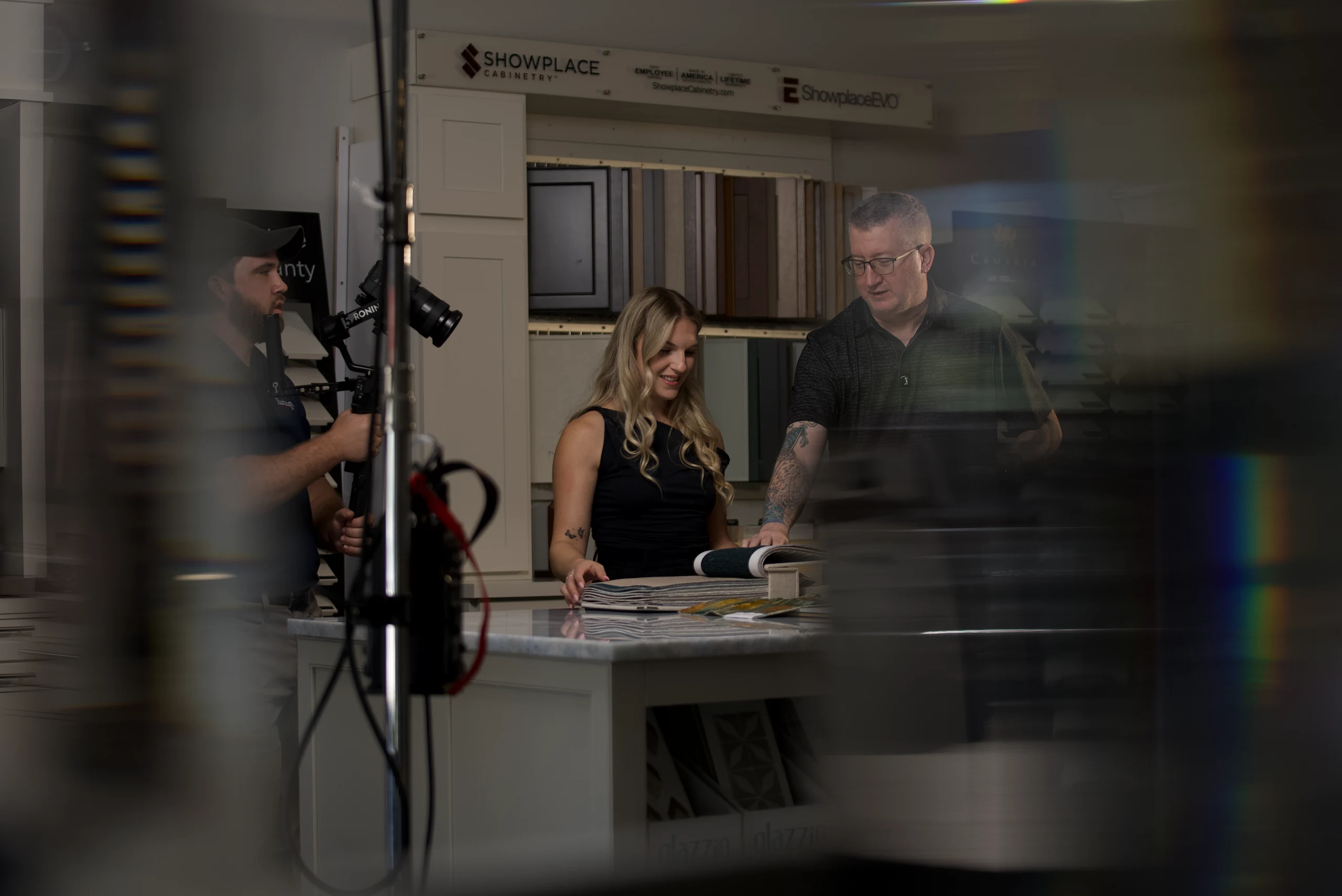 Grayhawk Remodeling staff reviewing cabinet samples in the showroom