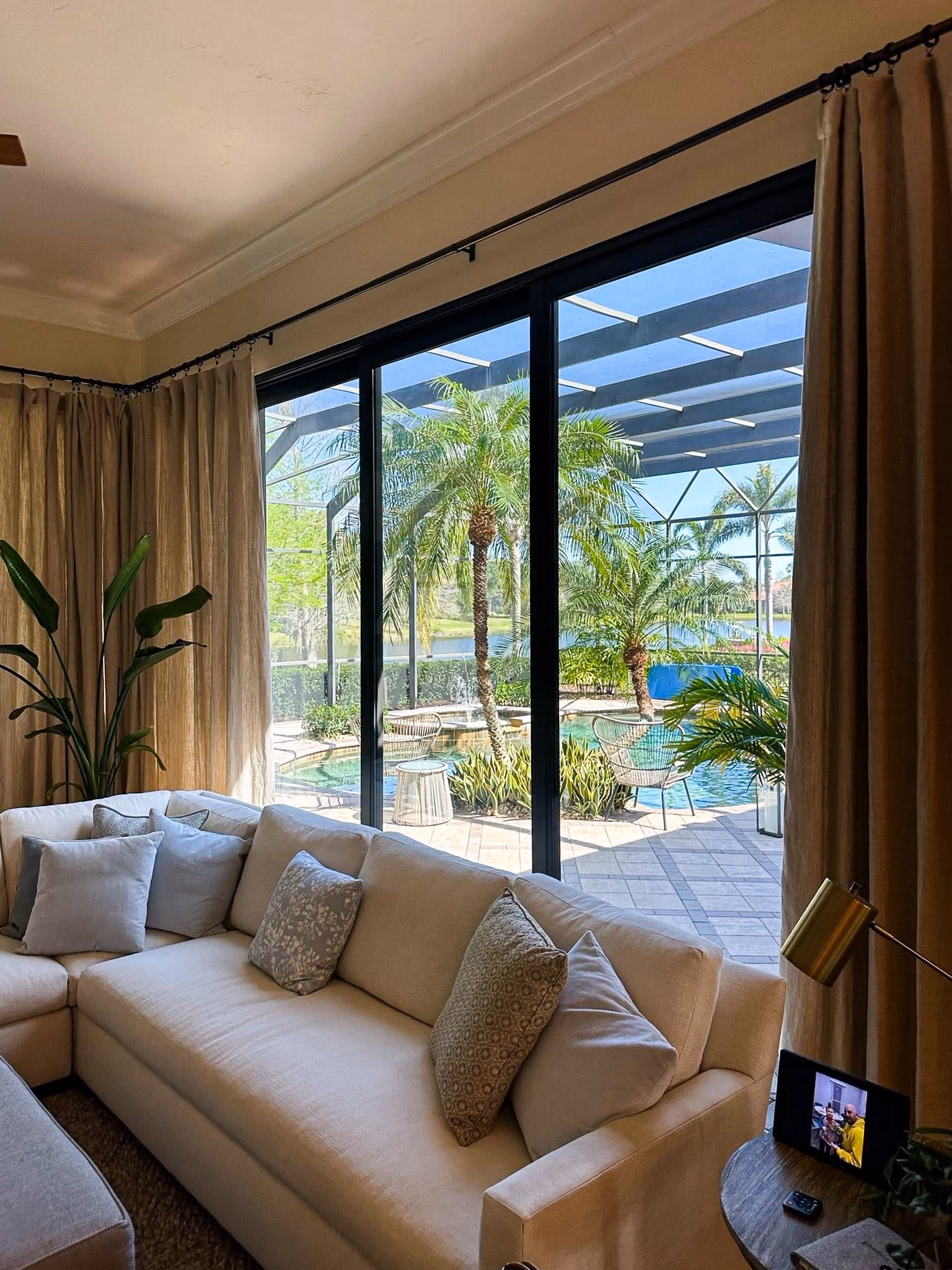 New sliding glass doors opening onto a pool lanai