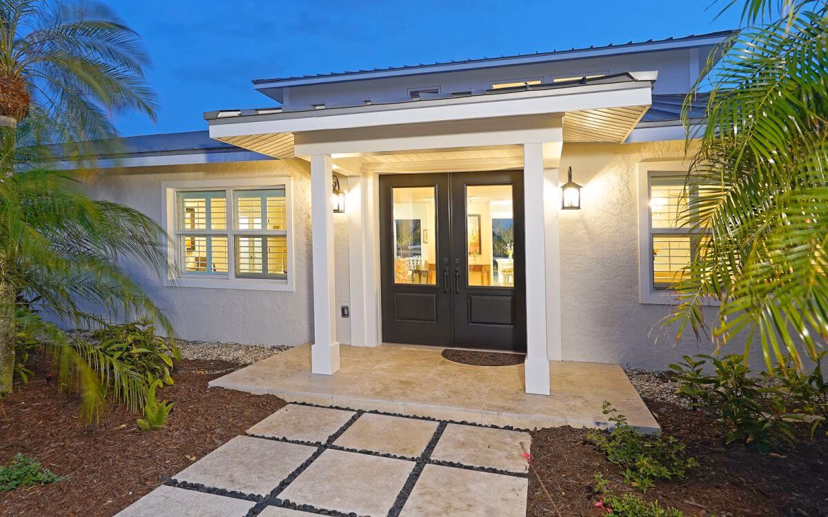 Bradenton home exterior at dusk after a Grayhawk remodel