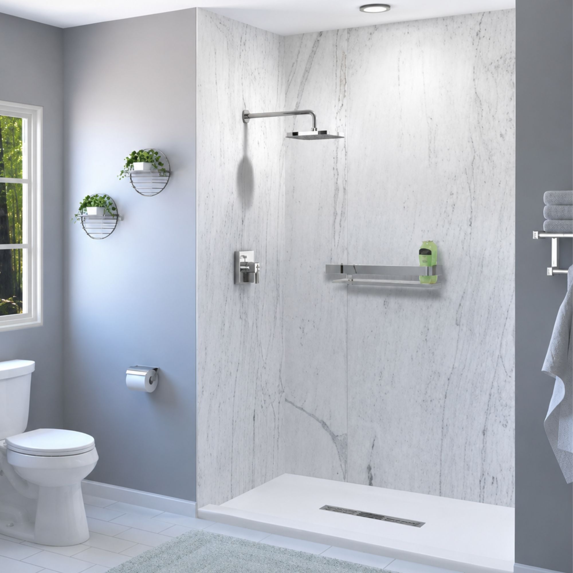 Low-threshold shower with marble-look wall panels and a linear drain
