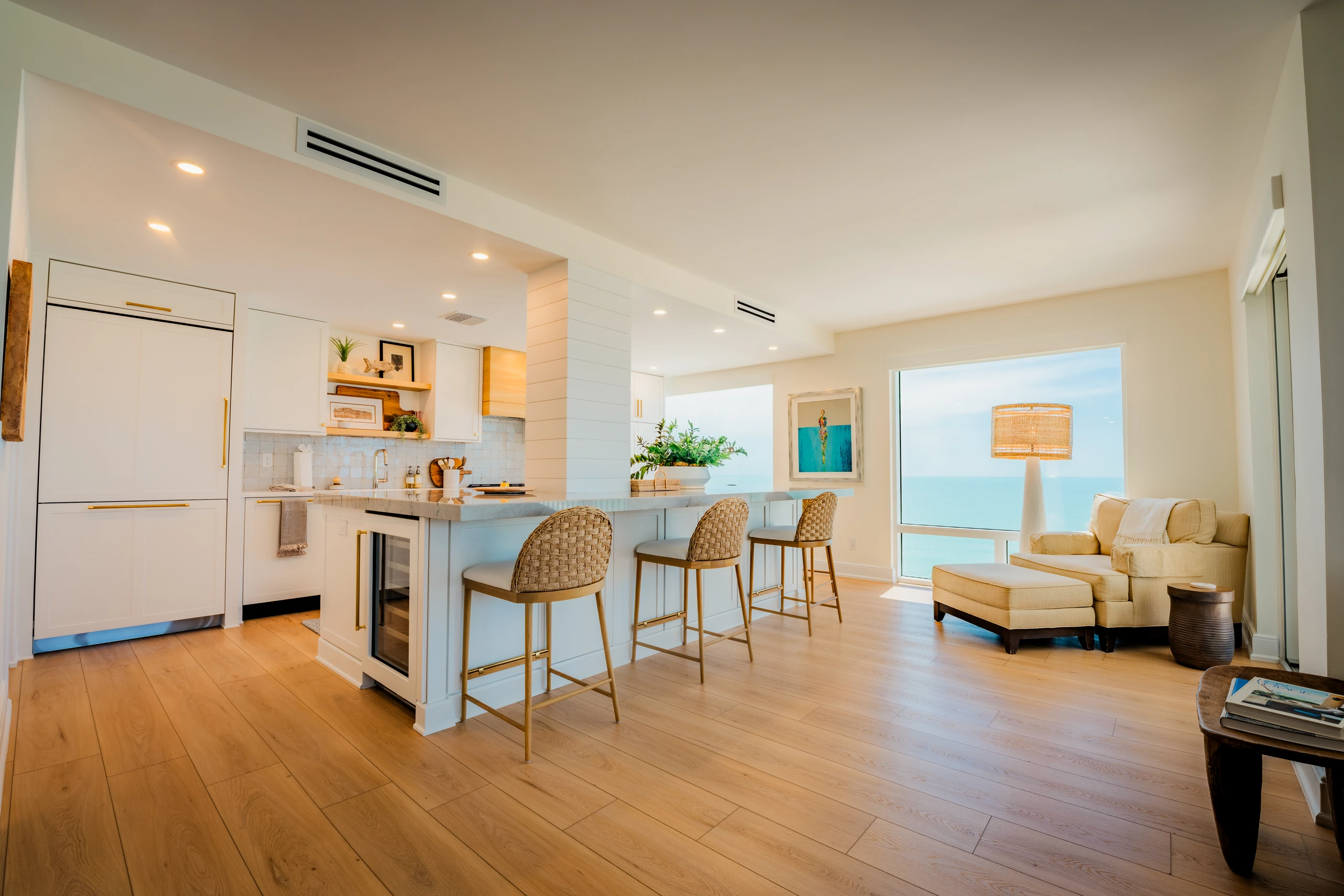 Remodeled open-plan kitchen and living area with Gulf views