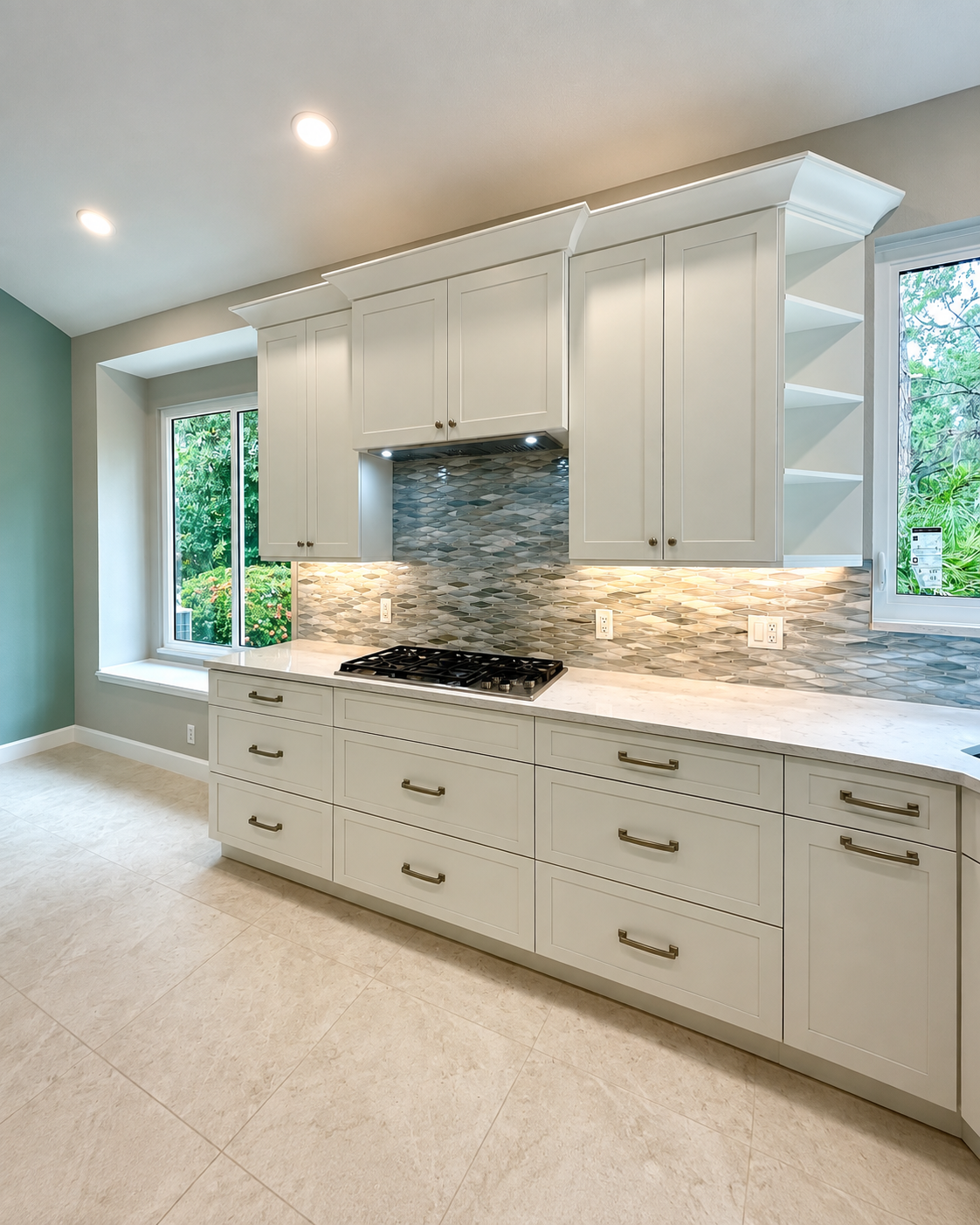 Kitchen wall of cabinets with open shelving and a mosaic tile backsplash