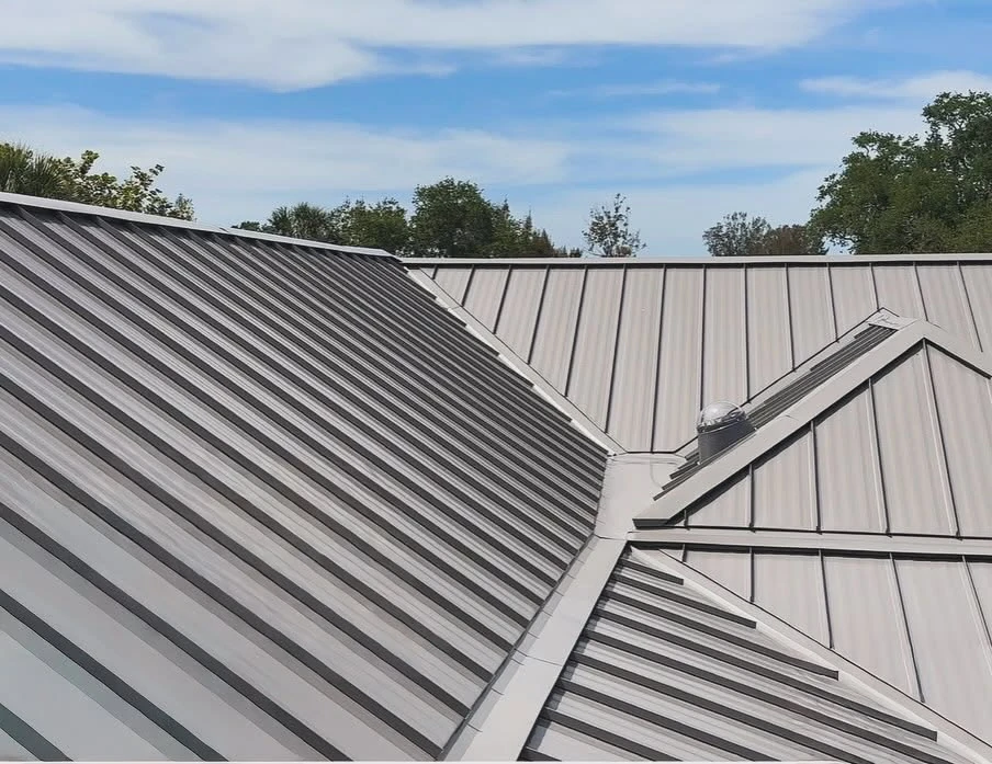 Standing seam metal roof with ridge detail on a Florida home