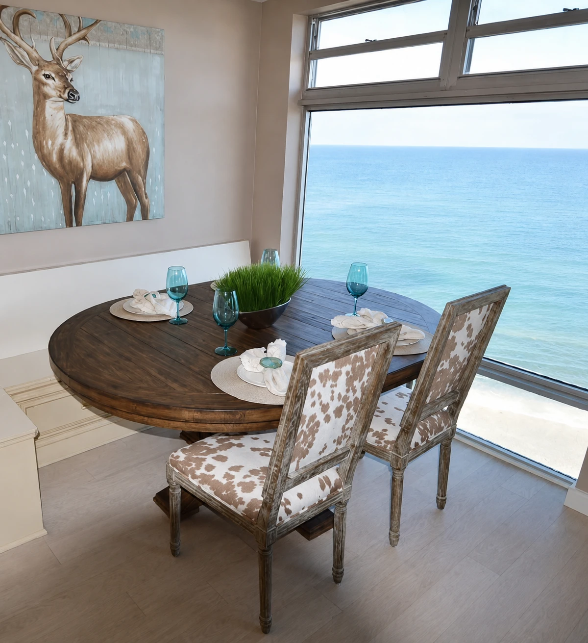 Breakfast nook with a corner window wall overlooking the Gulf