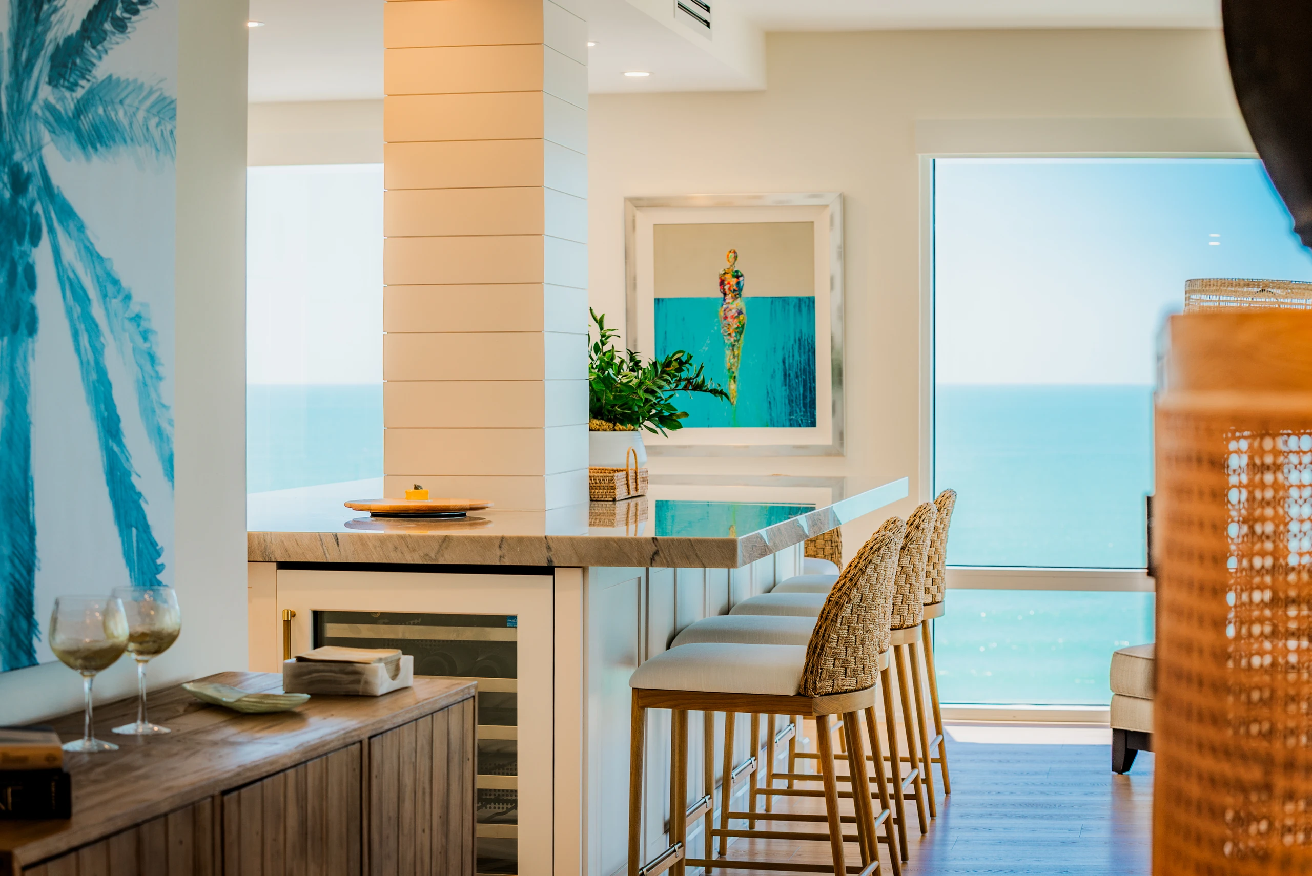 Beachfront condo kitchen with a bar counter and Gulf views