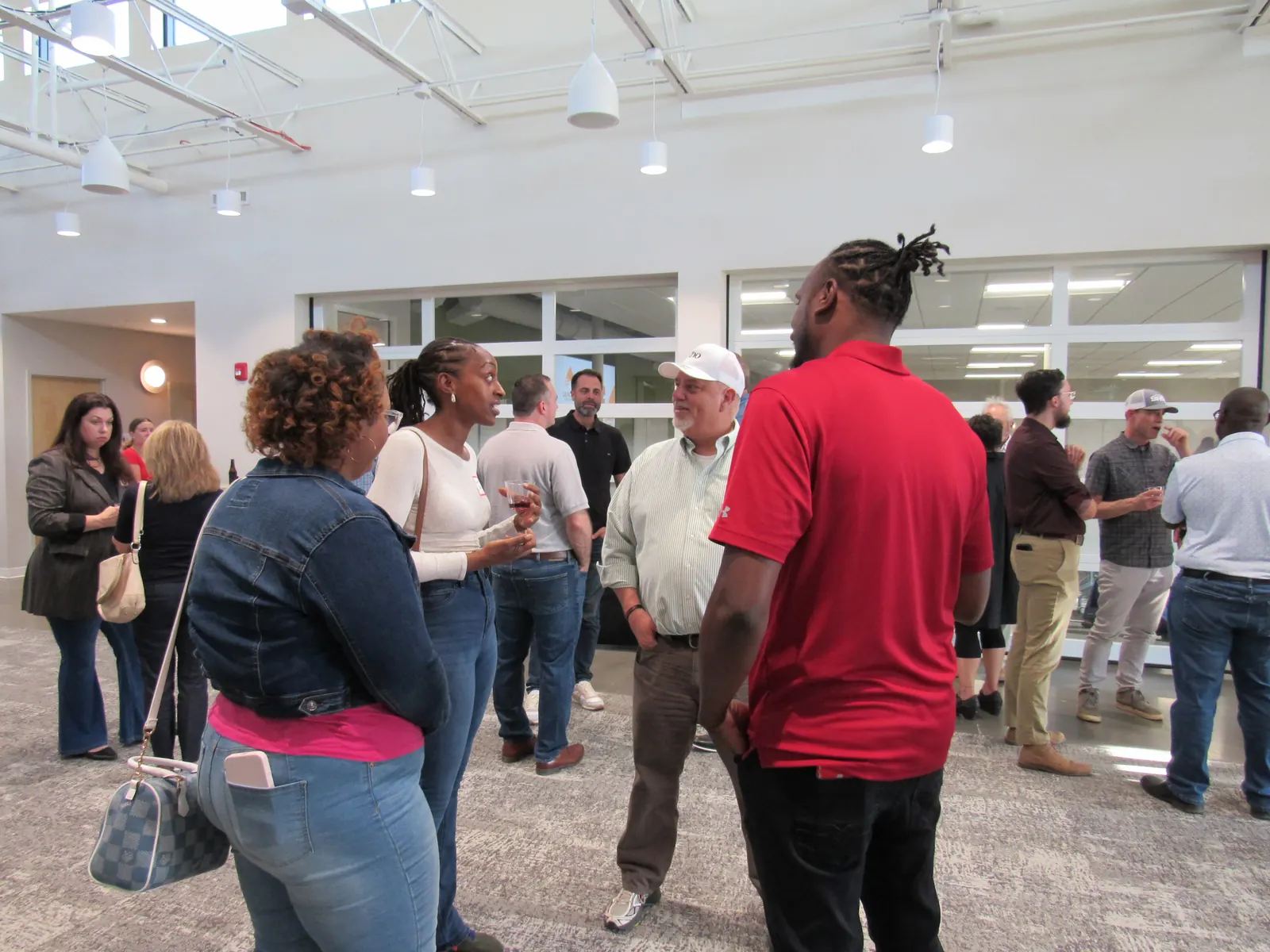 Founders and community members networking at a Launchpad gathering
