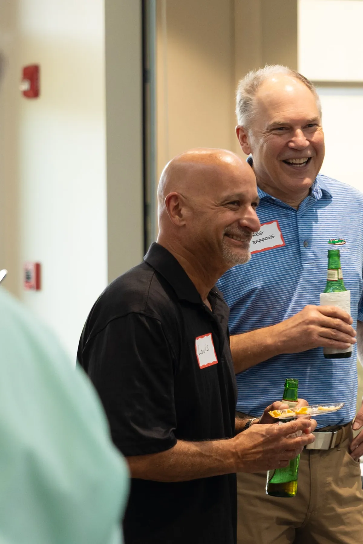 Founders laughing together at a Launchpad graduation event