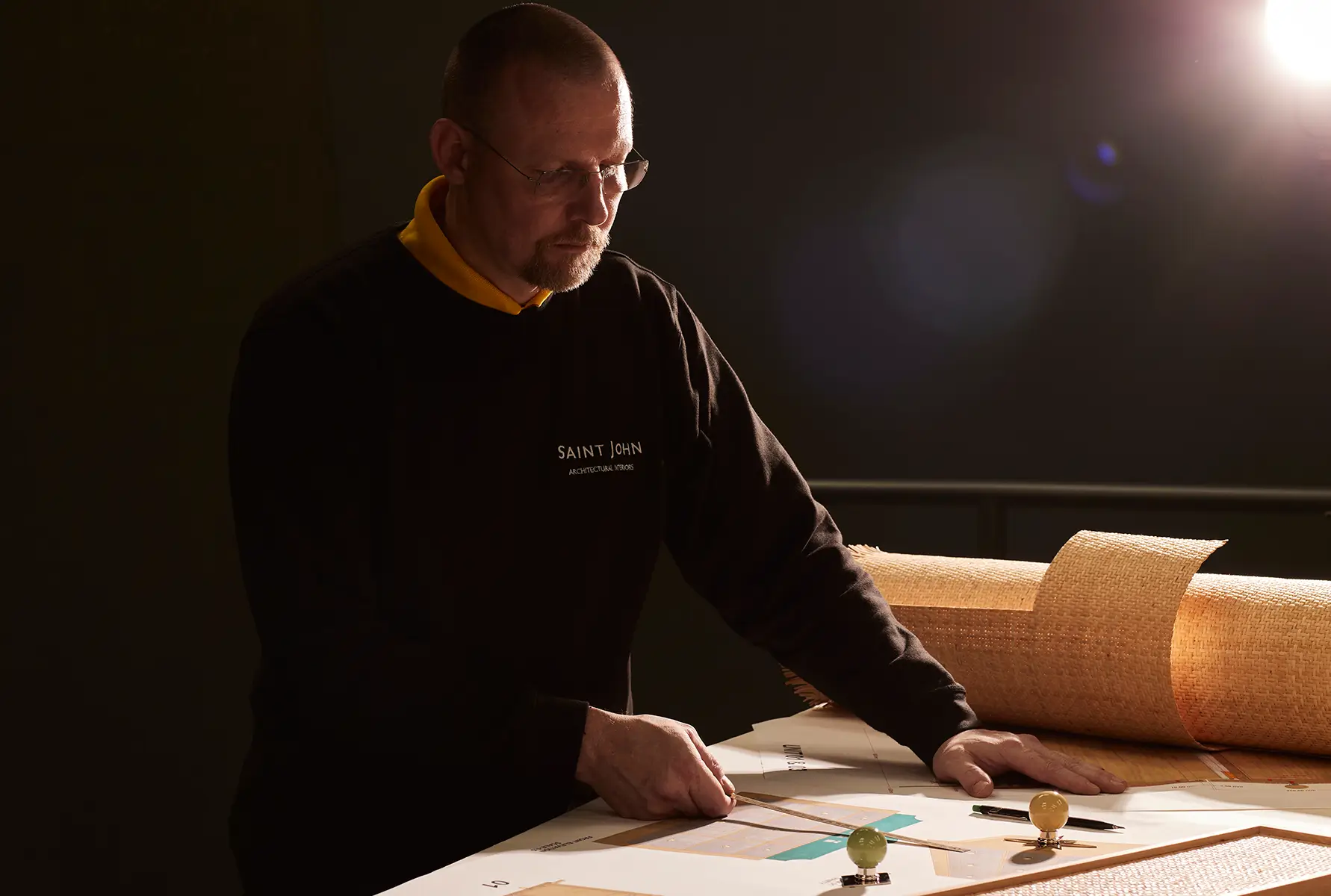 Person measuring a cabinet image