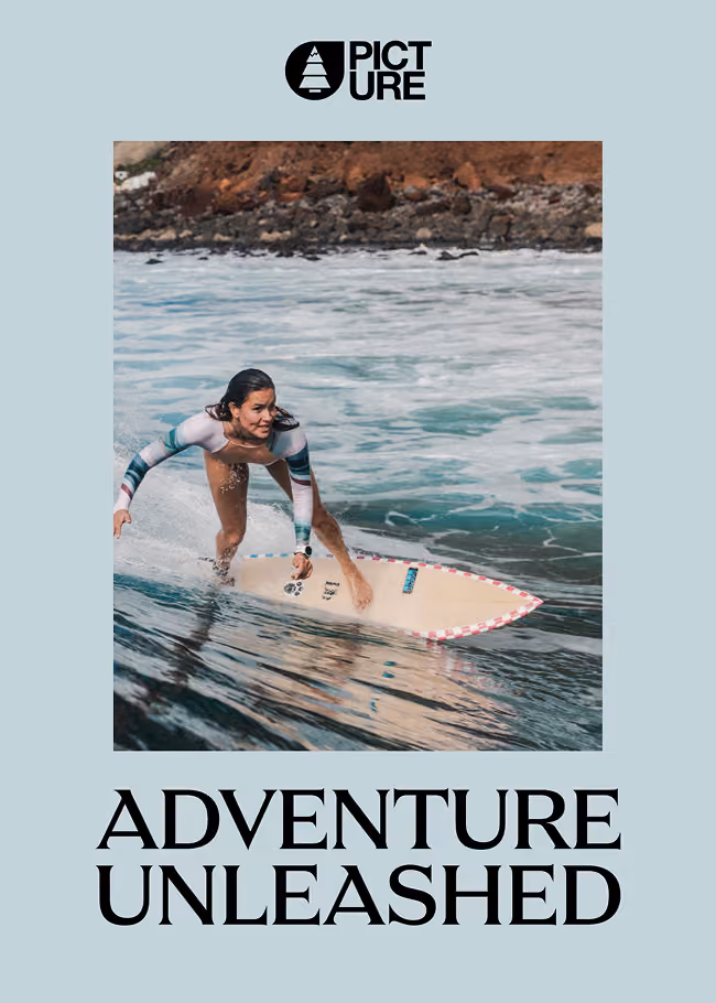 Woman surfing on a wave near a rocky shore with text Adventure Unleashed and Picture logo above.