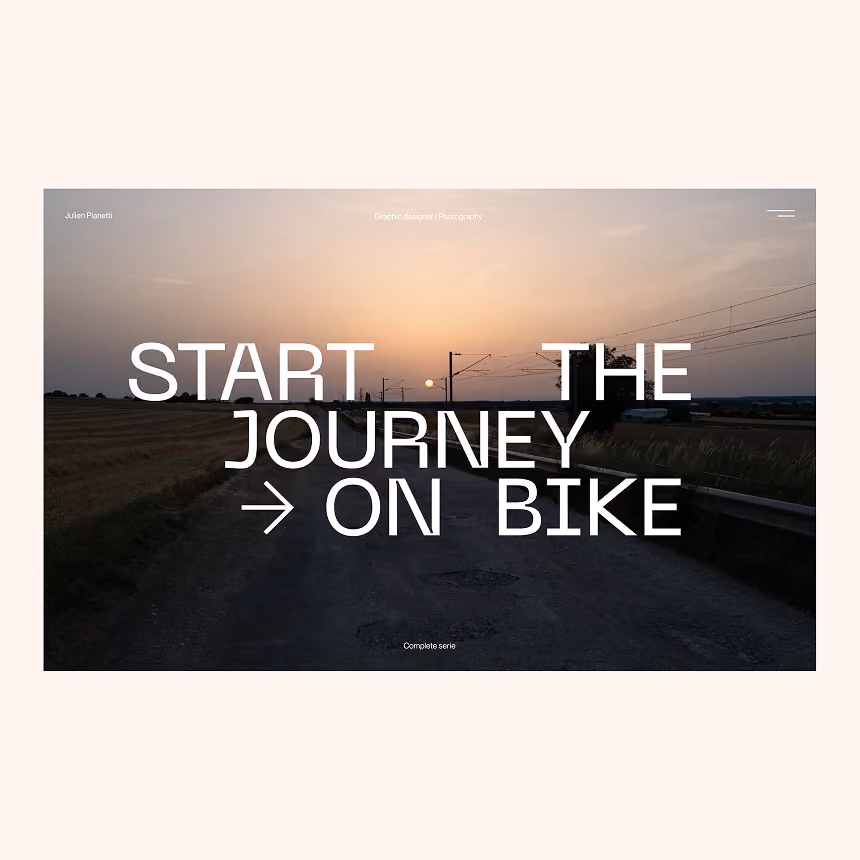 Sunset over a rural road with text overlay: Start the journey on bike and a right arrow.