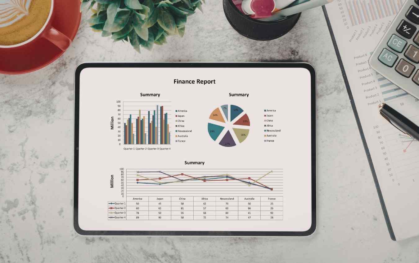 image of financial reports being reviewed