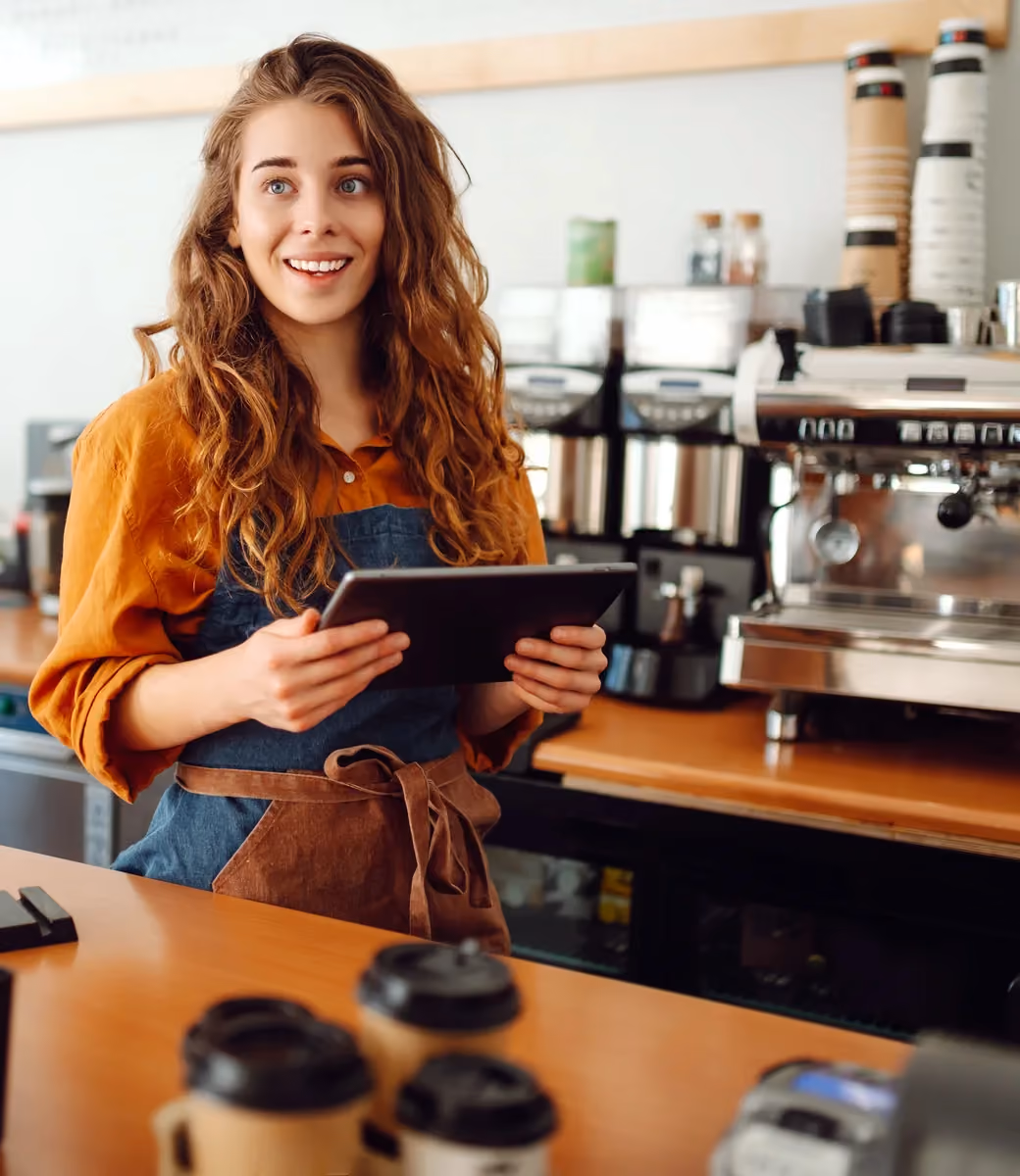 Fine dining staff member reviewing a point-based tip pool on a tablet.