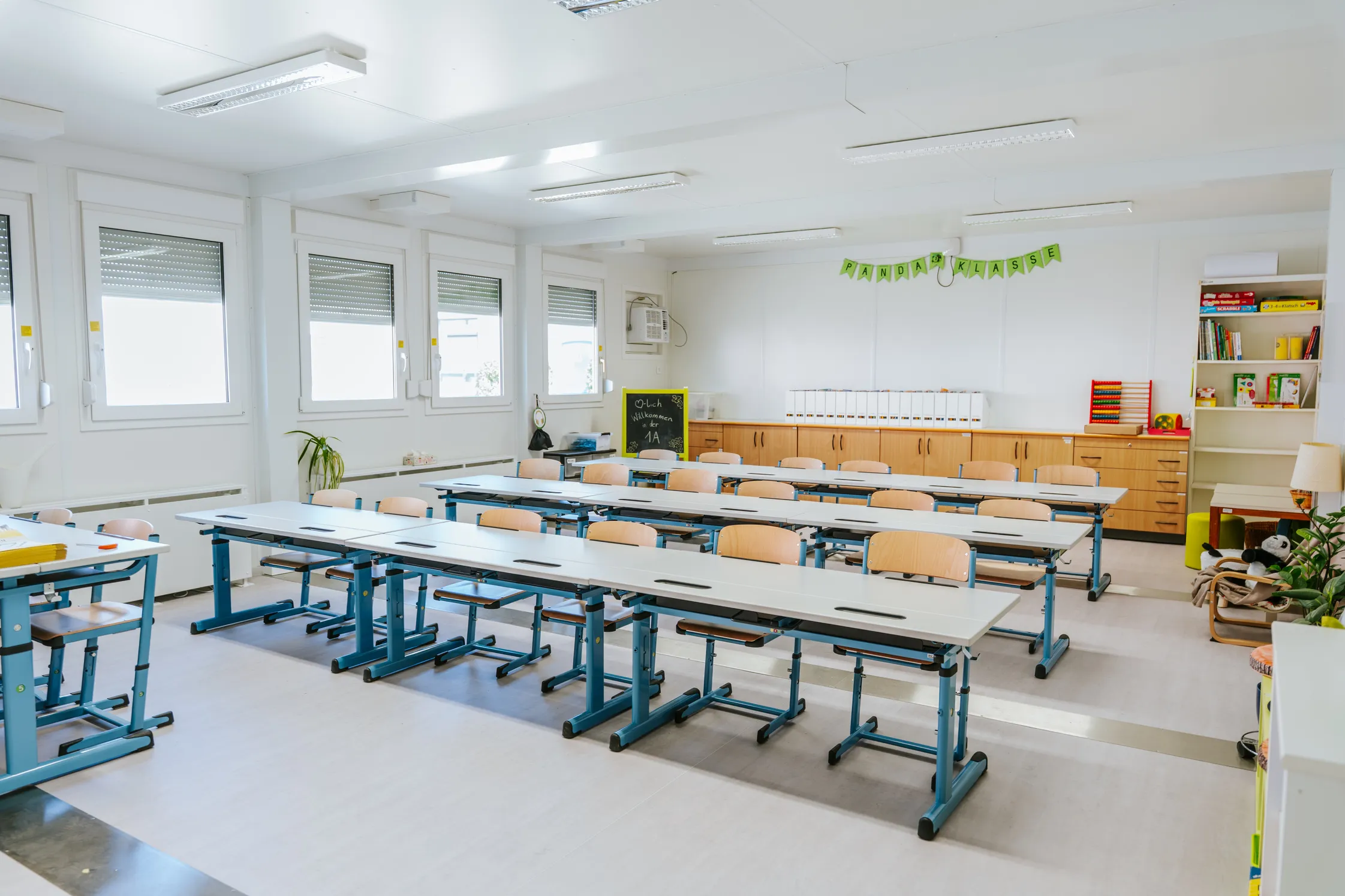 Temporary modular campus extension with connected classrooms and walkway systems