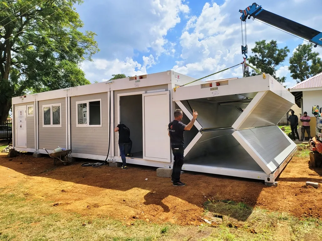 Modular container infrastructure for emergency housing