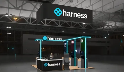 Exhibition booth with Harness branding featuring black panels, blue neon lights, a reception desk, and a hanging sign in an industrial space.