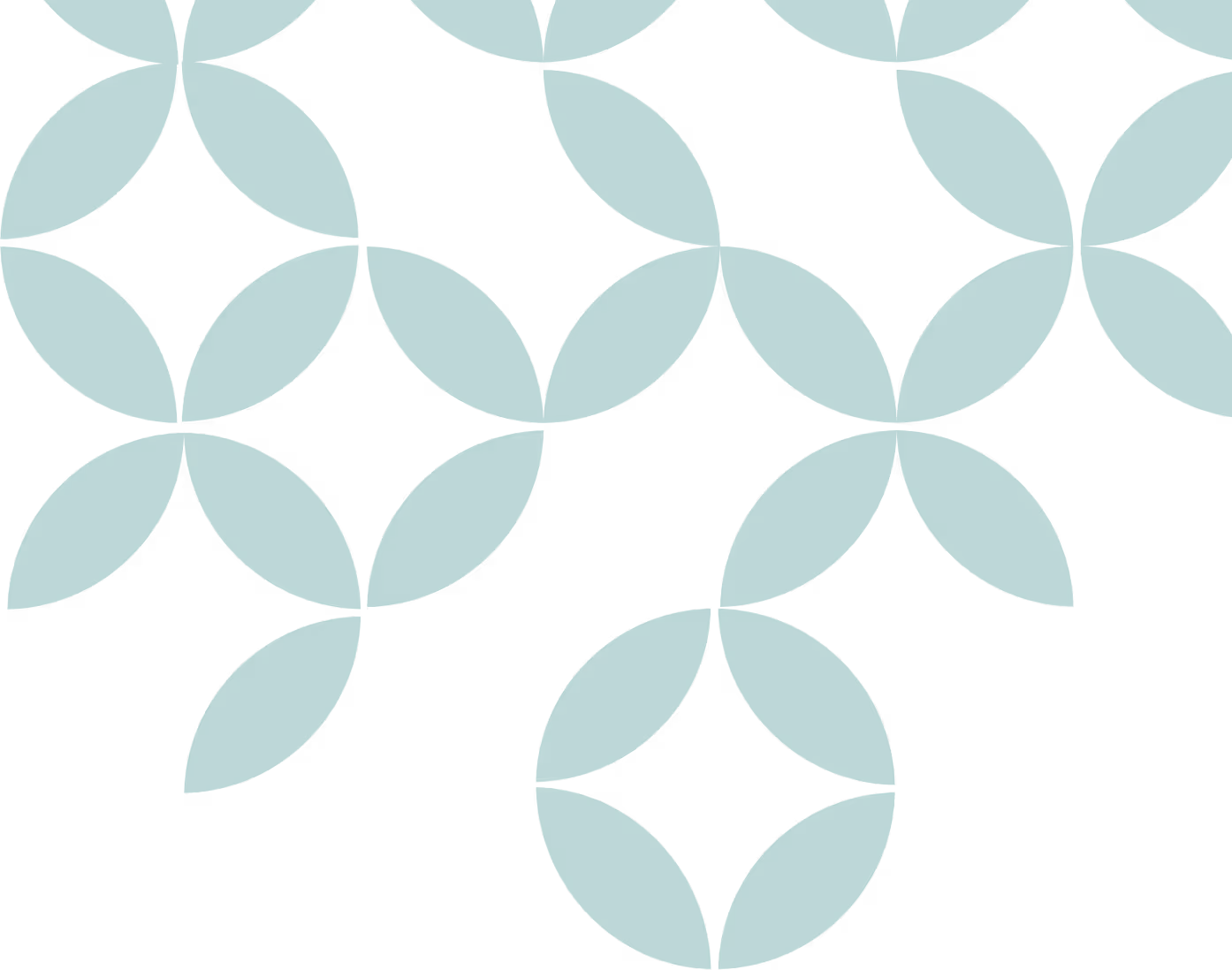 Abstract green geometric shapes resembling four-pointed stars or flowers on a black background.