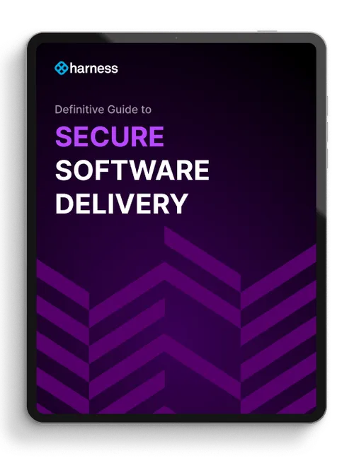 Ebook cover on a tablet titled 'Definitive Guide to Secure Software Delivery' with Harness logo and purple abstract chevron patterns on dark background.