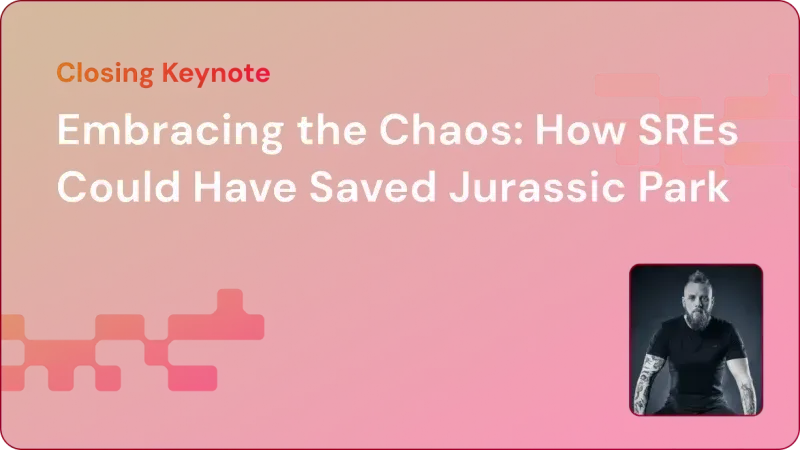 Presentation slide titled 'Embracing the Chaos: How SREs Could Have Saved Jurassic Park' with a photo of a bearded man with tattoos wearing a black shirt.